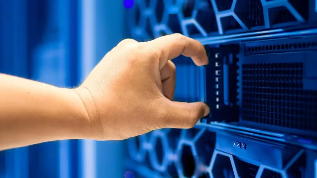 A server rack with cables representing the data infrastructure of a growth analytics stack